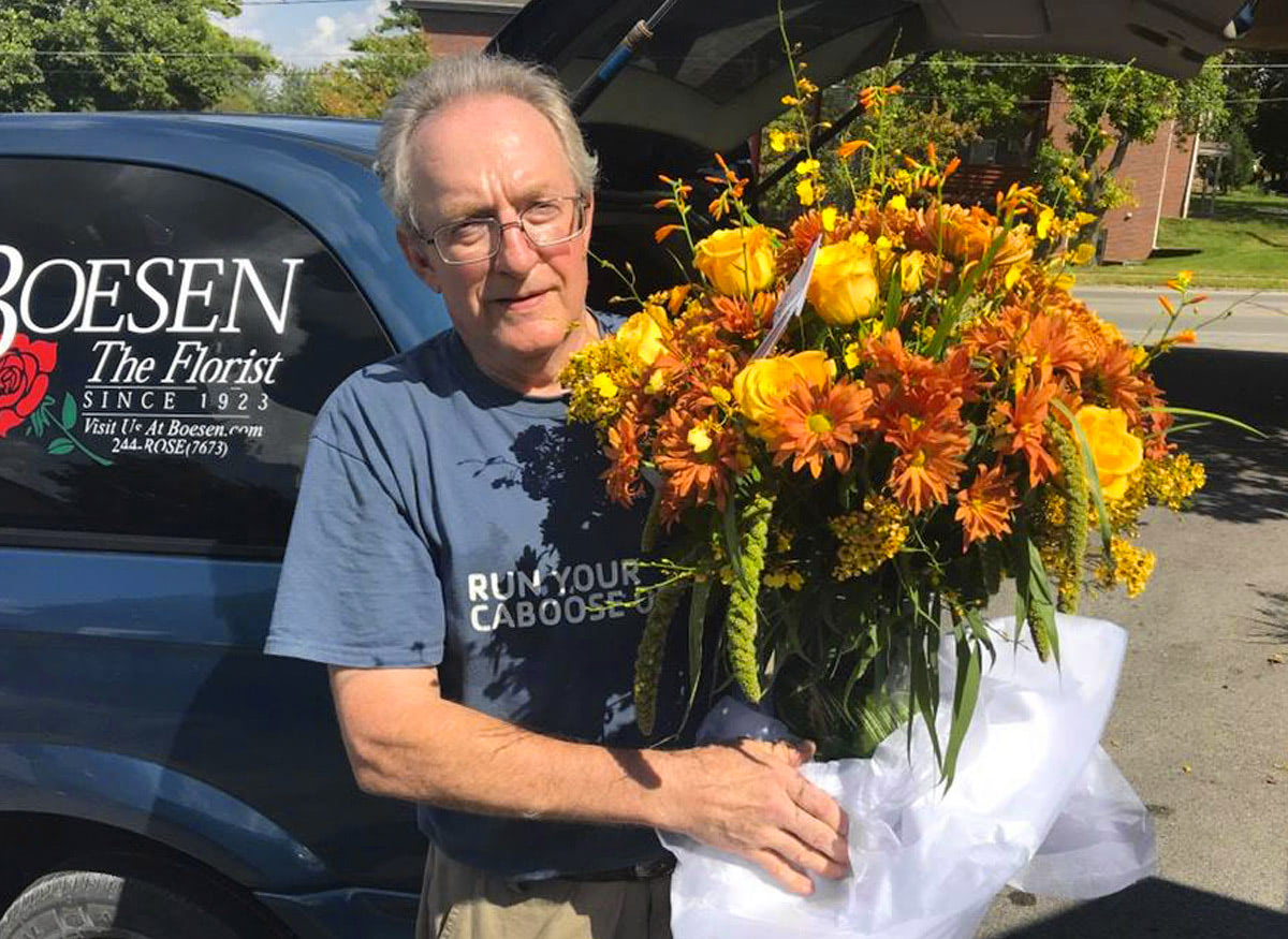 One of our skilled delivery drivers, about to depart with a fresh bouquet